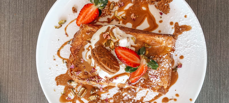 Top down view of a serve of biscoff french toast in Perth
